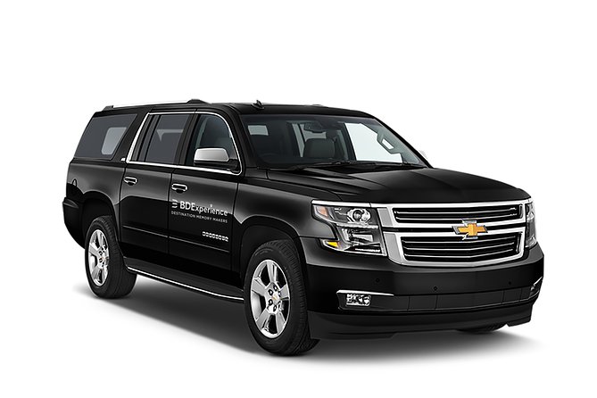 Luxury SUV Private Transfer R/T-Airport-Hotel-Airport- Playa del Carmen - Arrivals at Cancun Airport: the sign-and-driver setup that saves time