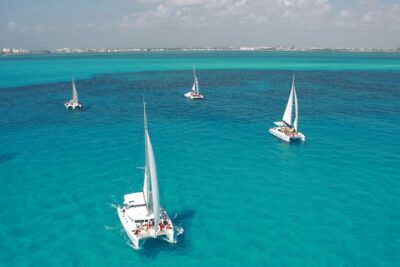 Mujeres Island Tour by Catamaran from Cancun City - Price, port fees, and what the “upgrade” conversation can mean