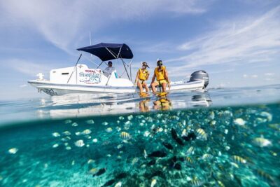 Parasailingcancun and Jet Ski tour over Cancun Bay - Hotel pickup, check-in, and the locker reality check