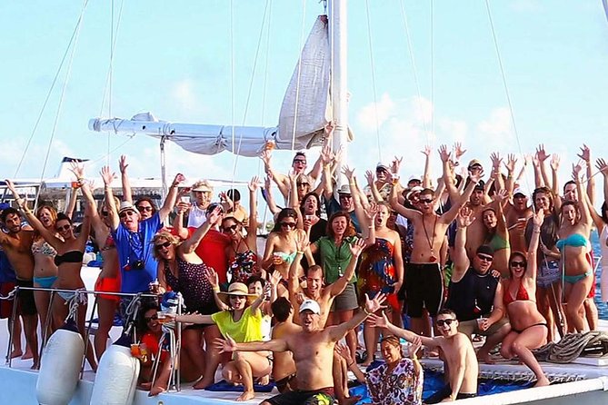 Party On Sailing Cruise to Isla Mujeres from Cancun - Stop 1 at Isla Mujeres: snorkeling and the beach club lunch setup