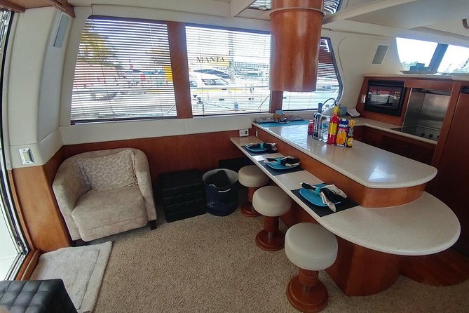 Playa Mujeres rent a Yacht 4hrs with Food and drinks aboard CA55 - Downtown Isla Mujeres on Your Terms (Yes, It’s Short)
