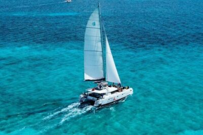 Plus Full Day Catamaran Tour to Isla Mujeres All Inclusive - Punta Sur and the Beach-Club Stop: The Core of the Day
