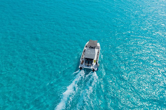 Private Atomic Catamaran Tour to Isla Mujeres - Snorkeling equipment included: what you should do with it