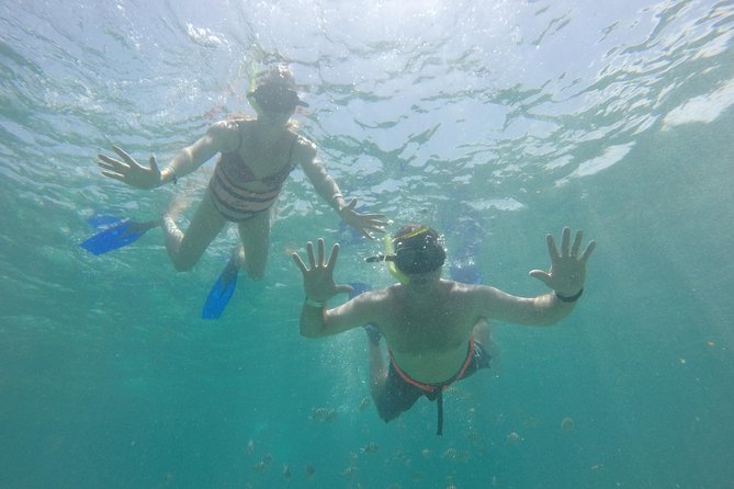 Private Catamaran Tour to Isla Mujeres with Snorkeling from Cancun - Lunch, Open Bar, and When Schedule Changes Matter