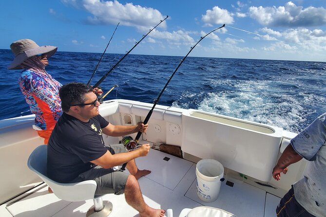 Private Deep Sea Fishing Tour in Isla Mujeres and Cancun - Stop 2 toward Cancun: pushing for sails, dorado, and more
