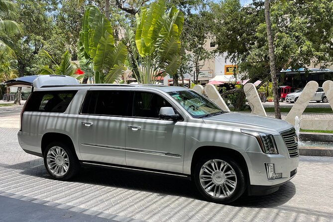 Private Luxury Transfer from Airport to Playa del Carmen - Onboard Comfort and Drinks: Towels, Waters, and Carajillo