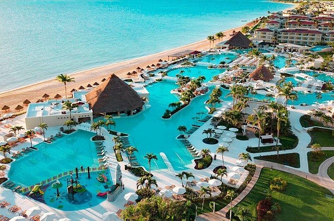 Private Shuttle in Cancun Airport and Moon Palace Sunrise - Arriving at Moon Palace Sunrise: Drop-Off at the Entrance With Help Unloading