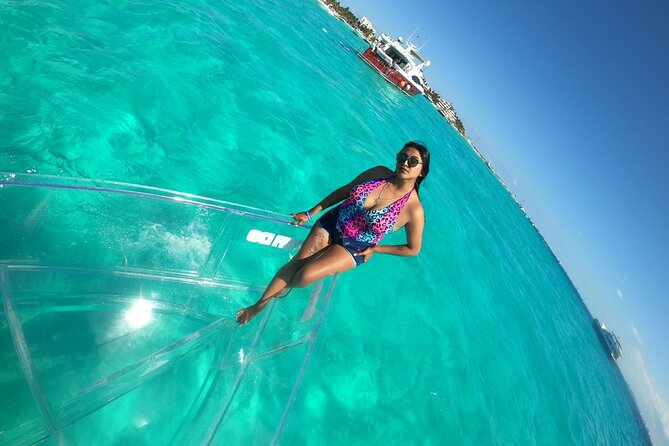 Private Tour Isla Mujeres excursion in Transparent Boat - El Farito Reef: Colorful Fish and the Most Intense Viewing Stretch