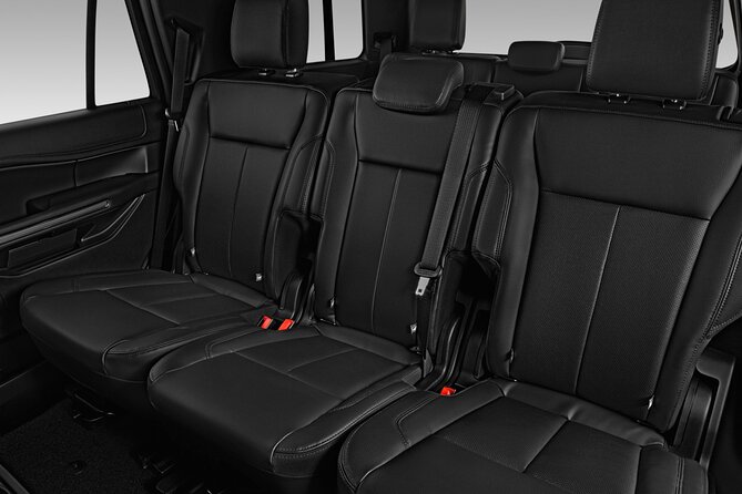 Private Transportation Deluxe Van - On-Board Perks: Beers, Luggage Help, and Local Recommendations