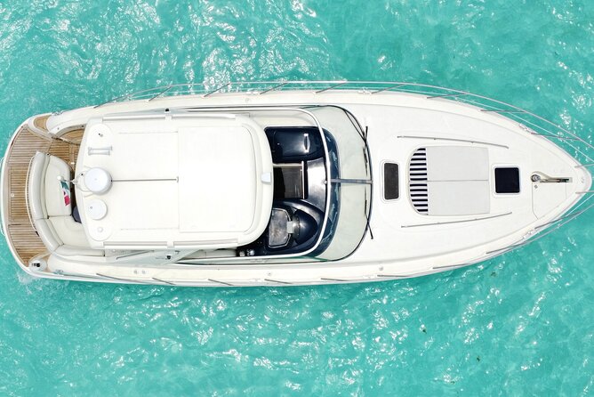 Private Yacht Rental in Cancun - Entering the water with snorkel gear that can make-or-break comfort