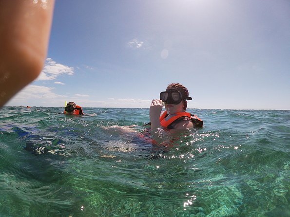 Reef Snorkel In National Park In Puerto Morelos With Lunch And Transportation - Boat time, reef safety, and the rules that affect what you bring