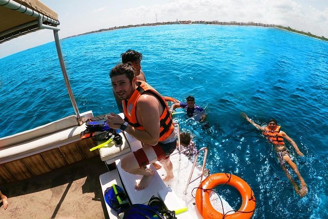 Reef Snorkeling in National Park from Cancun with Beachside Lunch - Puerto Morelos Free Time: Fishing-Village Walking and Beach Relaxation