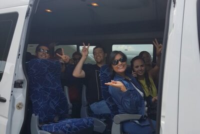 Round Trip Transfer from Cancun Airport to Playa del Carmen - Pickup at the airport: the name sign and flight-number tracking