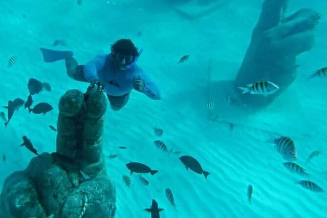 Sail Away Catamaran Day Trip with Snorkeling to Isla Mujeres - Isla Mujeres downtown free time: 1 hour goes fast