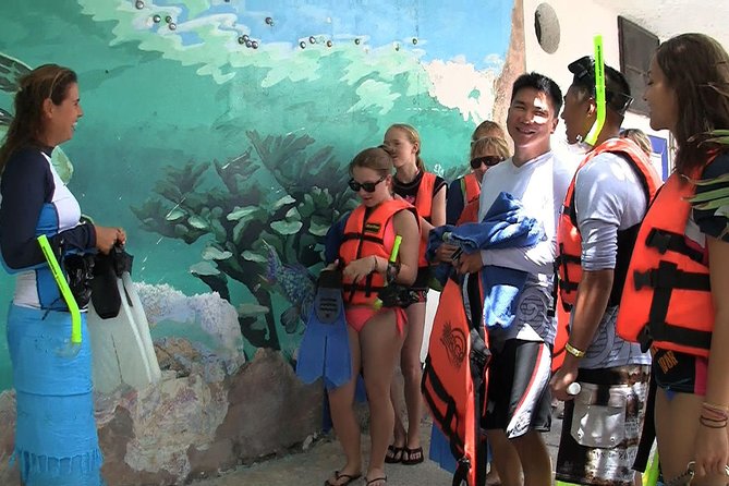 Sea Turtle Snorkeling Ecofriendly Tour from Cancun & Riviera Maya - The cenote stop: limestone light, darker water, and fun off the edge