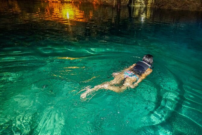Shared ATV's and Zip Lines and Swimming in a Real Cenote. - Swimming in a real cenote cavern: the cool-down you’ll feel