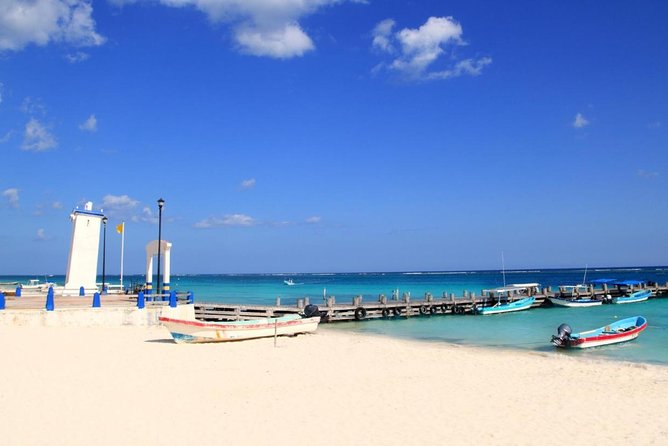 Snorkel in the turquoise Caribbean Sea in Puerto Morelos. Transport included - Board the boat in Puerto Morelos: a fishing village, not a theme park