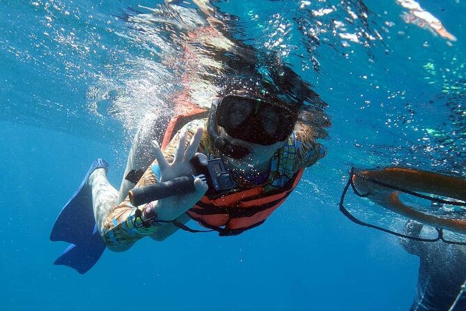 Snorkel Tour at Musa and Manchones Reef - Musa Underwater Museum: Statues, the Sunken VW Beetle, and What to Look For