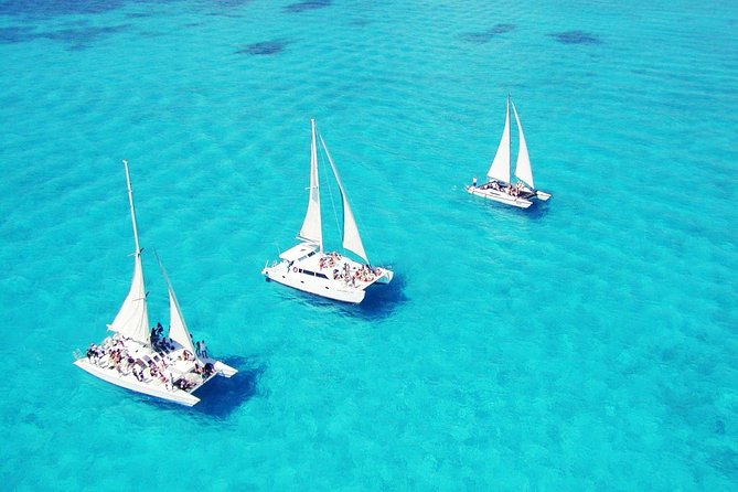 Snorkeling Adventure at Isla Mujeres Includes Lunch and Open Bar - Classic vs Platinum catamaran: what the smaller group really changes