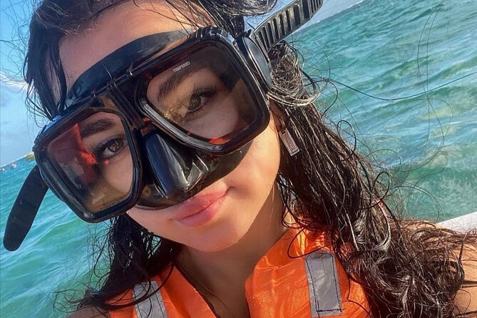 Snorkeling tour Express in Cancun with Certified Guide - Getting onto the boat: docks, weather, and smooth boarding