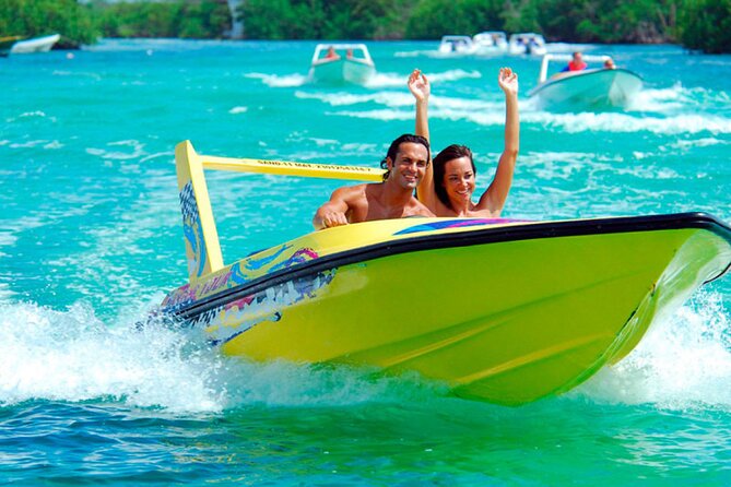 SpeedBoat Jungle Tour + Snorkel Experience in Cancun - Driving a speedboat through the Caribbean Sea