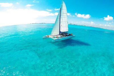 Tour in a Catamaran to Isla Mujeres with all included for the best price! - Price and the real cost: where $20 can multiply