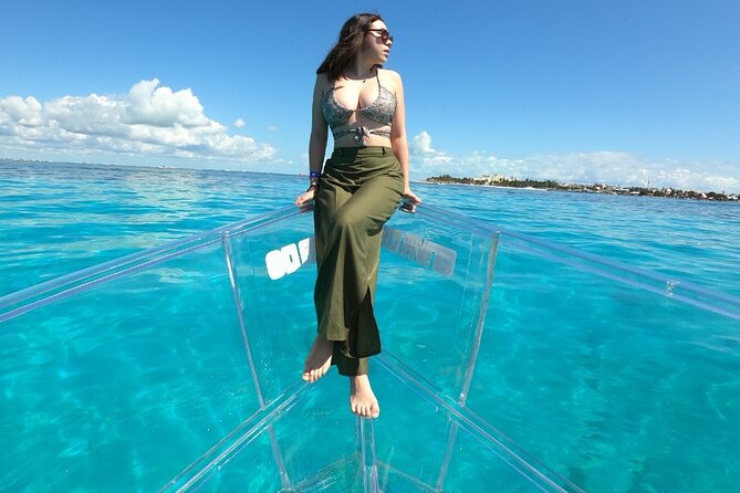 Tour Isla Mujeres excursion in Collective Transparent Boat - Who Runs the Show: Captains, Guides, and Friendly Service
