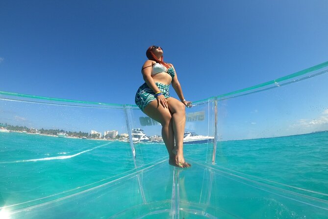 Tour Isla Mujeres excursion in Collective Transparent Boat - Timing: Early Calm Water Helps the Wildlife Odds