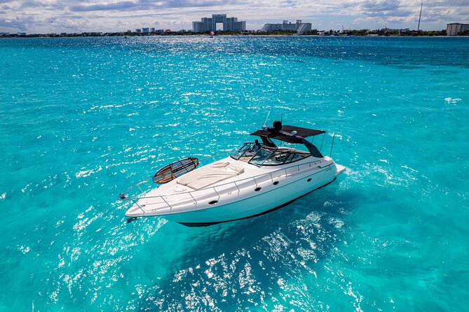 Tour to Isla Mujeres on Premium Yachts from Cancun - Onboard comfort: snacks, drinks, bottled water, and snorkeling gear