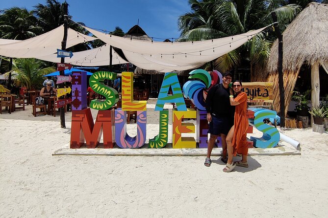 Trip to Isla Mujeres by Catamaran, with snorkeling and drinks - Open bar, buffet, and deck photos: what this day does well for photos and fun