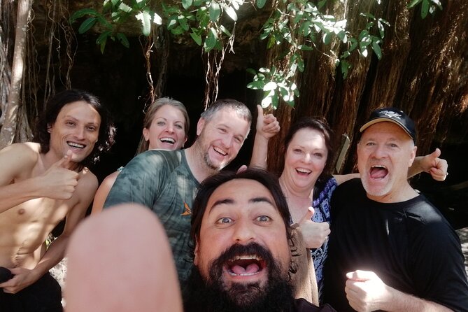 Tulaka Cenote Experience - Chikin Ha cenotes: semi-cave rock walls and sunlit reflections