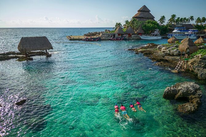 Xcaret Park Tickets Roundtrip Included from Cancun - Getting to Xcaret: Round-trip pickup that saves real energy